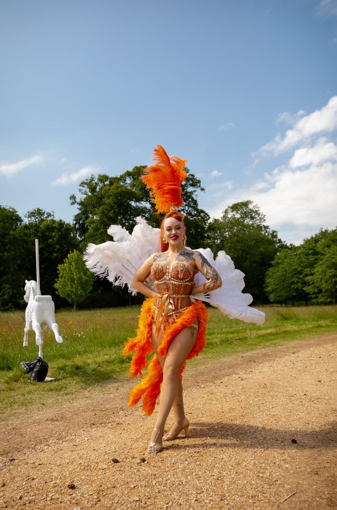 Can-Can dancer in orange and white costume