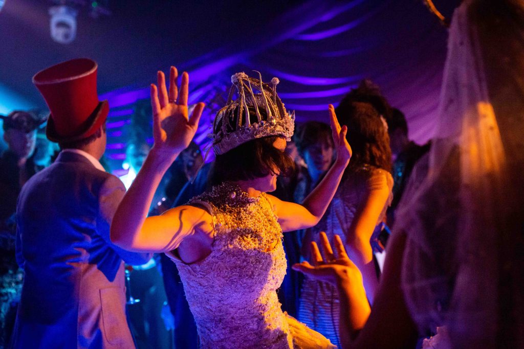 People dancing in various poses.