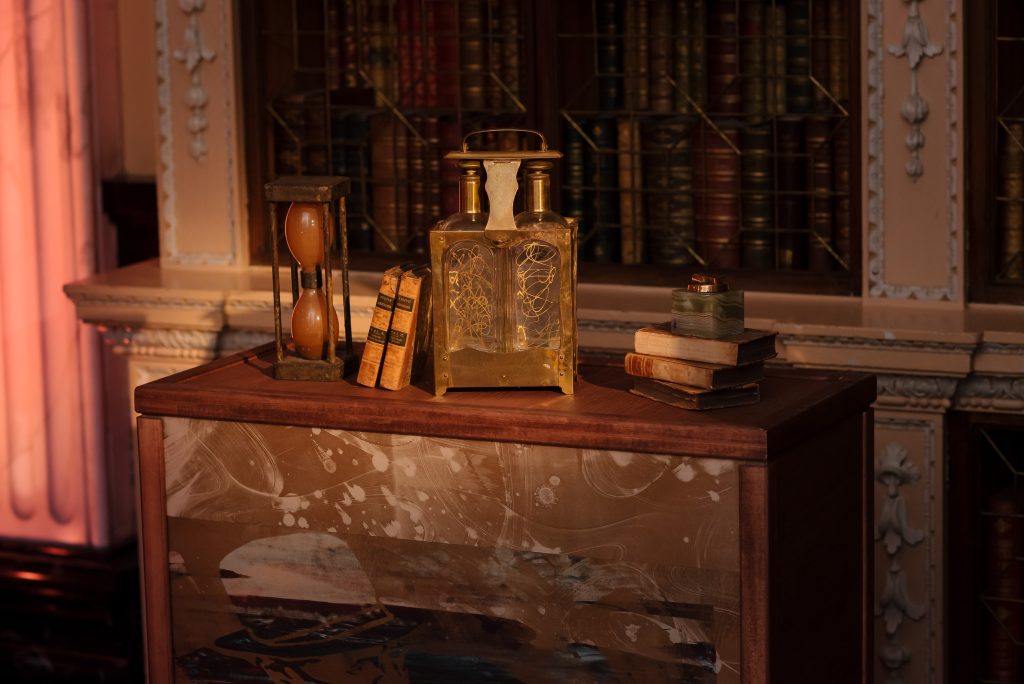 Antiques resting on a wooden console table.